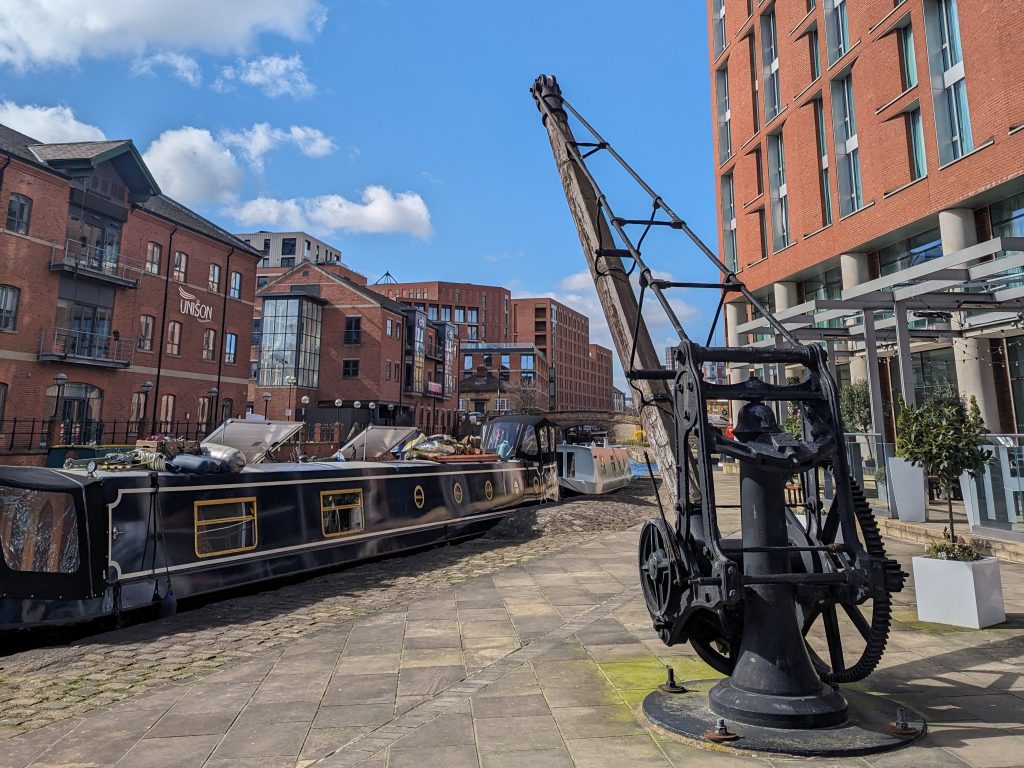 A lifting crane next to the water at Granary Wharf